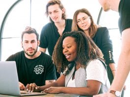woman sharing her presentation with her colleagues